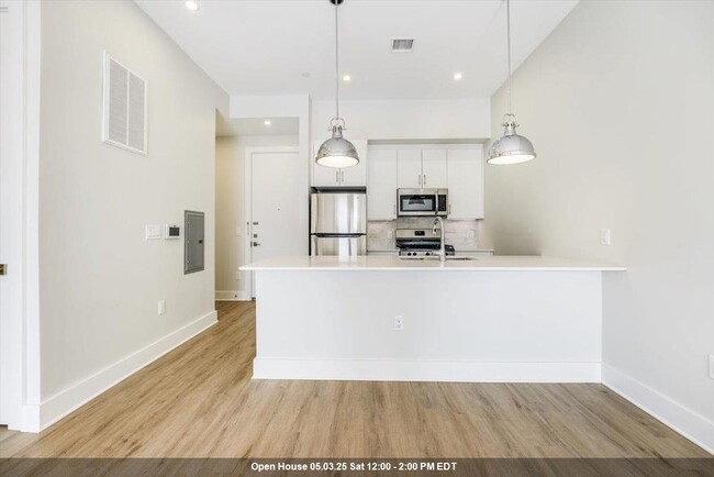 property at 667-665 Grand St