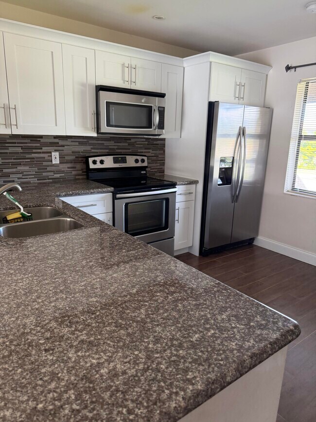 property at 8341 Boca Glades Blvd E