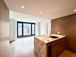 111 W 56th St in New York, NY - Building Photo - Building Photo