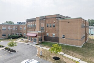 Highland School Apartments in Tonawanda, NY - Building Photo