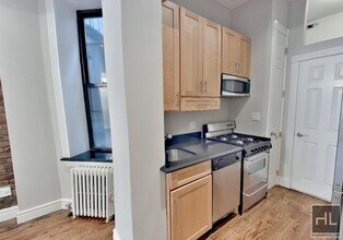 Mott Street in New York, NY - Building Photo - Building Photo