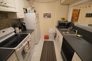 94 Pleasant St, Unit 1 in Brookline, MA - Building Photo