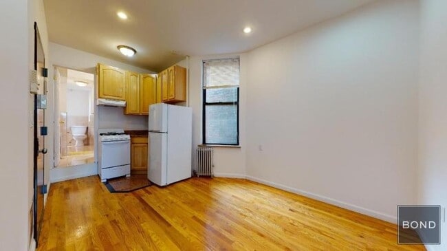 property at 214 E 10th St