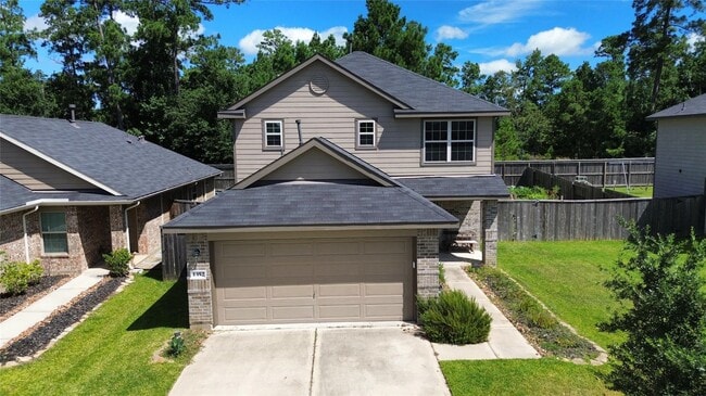 1352 Winding Willow Dr in Pinehurst, TX - Building Photo - Building Photo