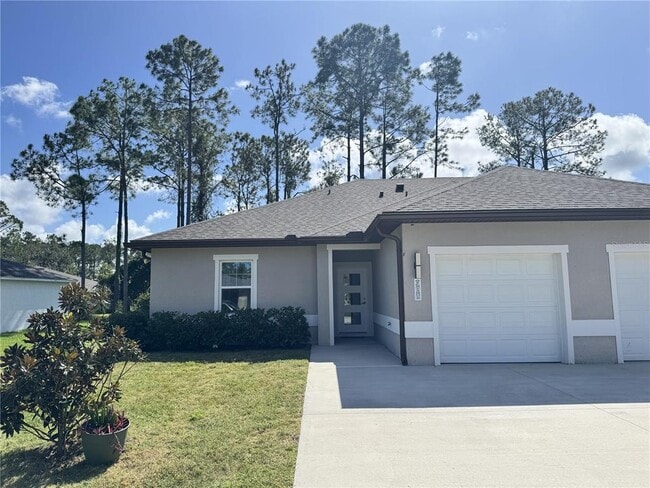 98 Wheatfield Dr in Palm Coast, FL - Foto de edificio - Building Photo