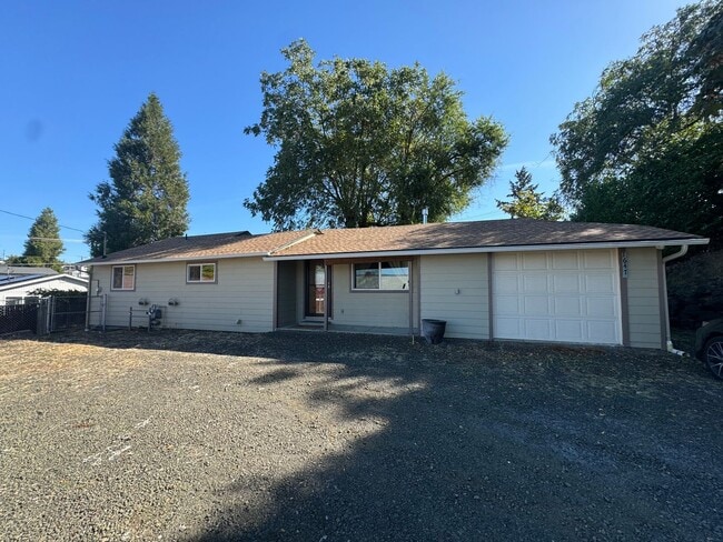 property at 1647 NW Mulholland Dr