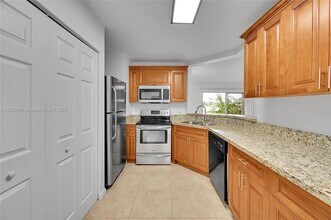 3453 NW 44th St, Unit 107 in Lauderdale Lakes, FL - Foto de edificio - Building Photo