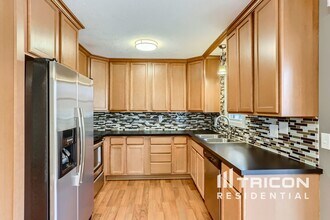 11233 Nevada Ave N in Champlin, MN - Foto de edificio - Building Photo