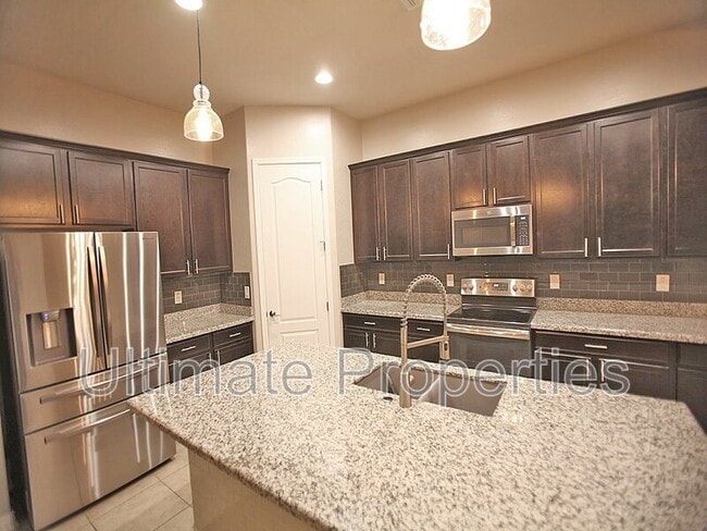 property at 8548 W Midway Ave