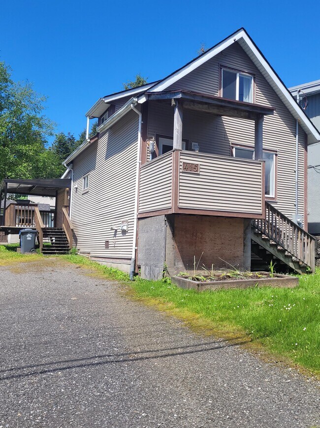 property at 415-411 11 Ave E