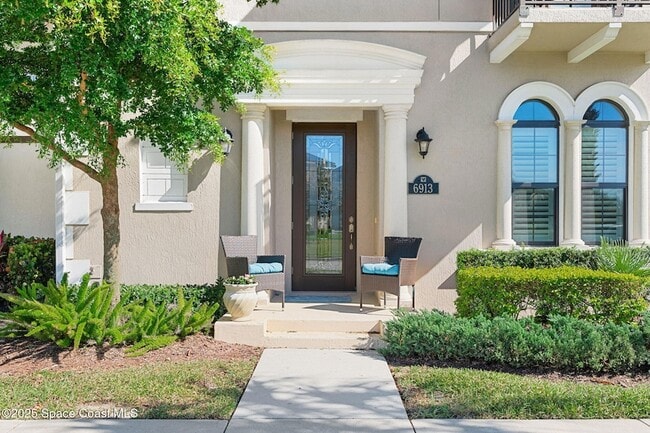 6913 Vista Hermosa Dr in Melbourne, FL - Foto de edificio - Building Photo
