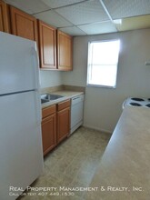 5887 Curry Ford Rd-Unit -#C in Orlando, FL - Building Photo - Building Photo