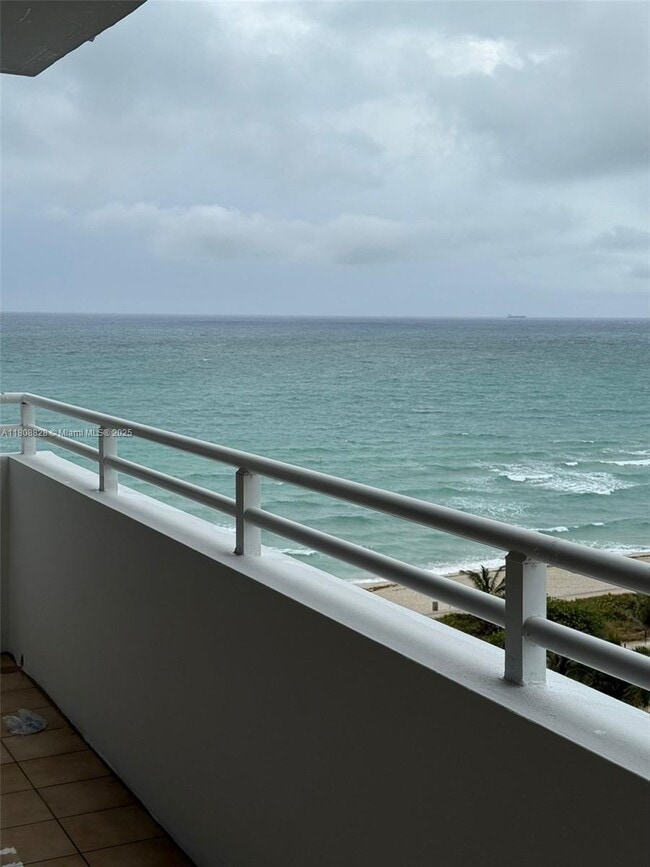 property at 8911 Collins Ave