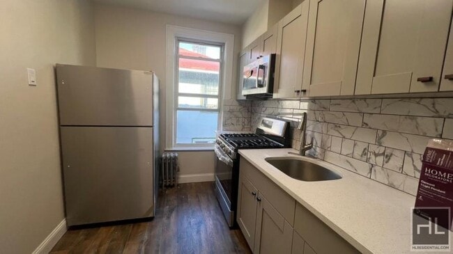 property at 433 E 2nd St