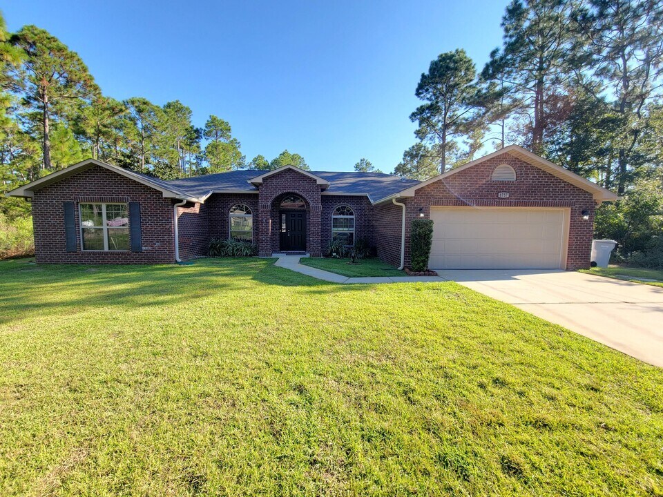 8757 Olivera St in Navarre, FL - Building Photo