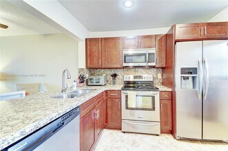 851 NE 207th Ln, Unit 203-13 in Miami, FL - Building Photo - Building Photo