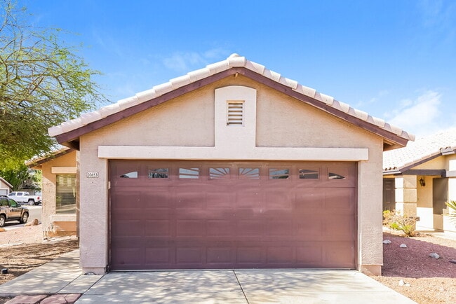 property at 10653 W Poinsettia Dr