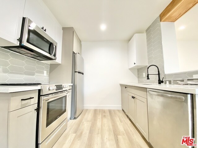 6350 Willoughby Ave-Unit -5A in Los Angeles, CA - Foto de edificio - Building Photo