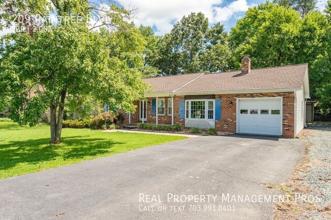property at 209 Raintree Blvd