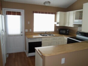 9644 W Chatfield Ave in Littleton, CO - Building Photo - Building Photo