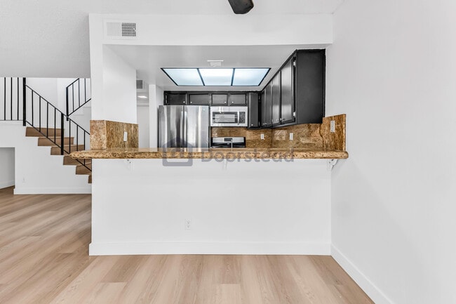 15555 Nordhoff St in North Hills, CA - Building Photo - Building Photo