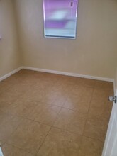 124 NW 12th Dr, Unit Apartment #2 in Belle Glade, FL - Building Photo - Building Photo