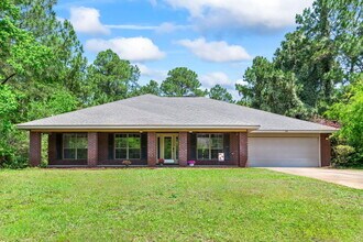 7134 Snug Waters Rd in Navarre, FL - Building Photo - Building Photo