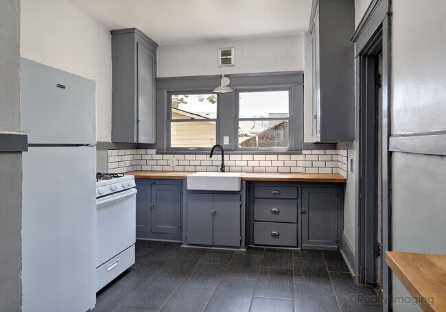 property at 6015-6017-6017 SE 99th Ave