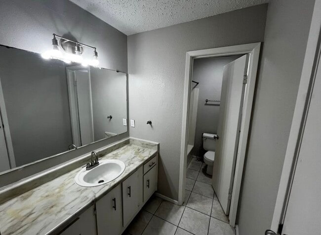 property at 12118 W Bellfort Ave