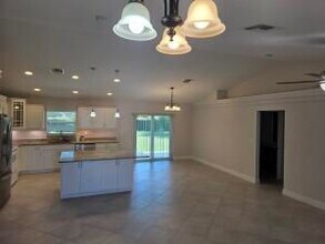 5996 NW Baynard Dr in Port St. Lucie, FL - Building Photo - Building Photo