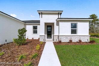 591 Harrisburg St SW in Palm Bay, FL - Foto de edificio - Building Photo