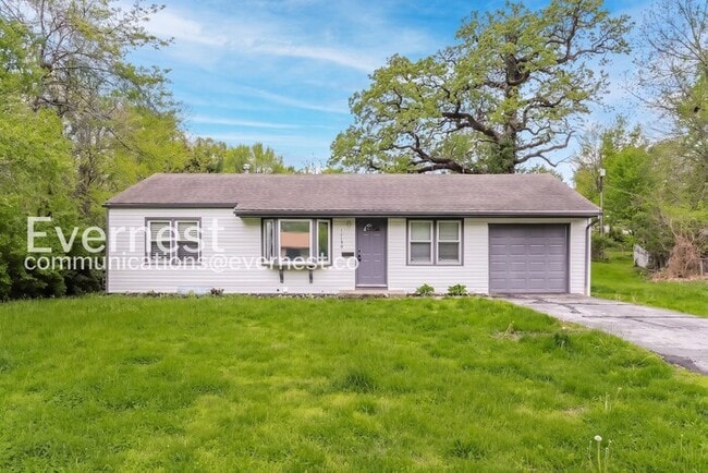 property at 11709 E 30th St S