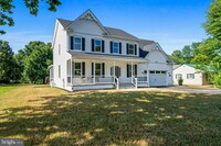 12945 Spring Cove Dr in Lusby, MD - Foto de edificio - Building Photo