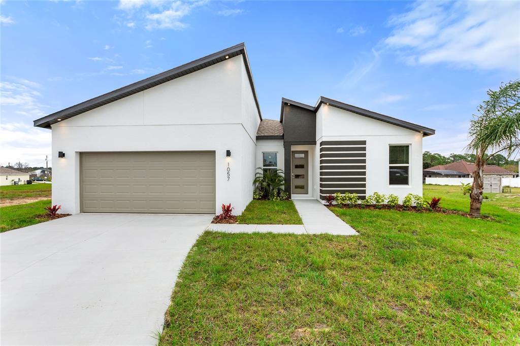 1057 Sabine Pl in Poinciana, FL - Building Photo