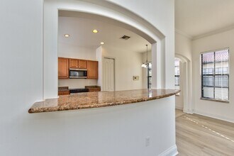 1310 Corso Palermo Ct-Unit -4 in Naples, FL - Building Photo - Building Photo