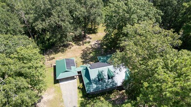 150 County Rd 3370A in Cleveland, TX - Foto de edificio - Building Photo