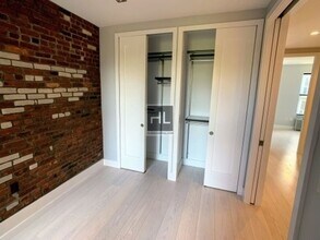 STANTON ST., Unit 5E1 in New York, NY - Foto de edificio - Building Photo