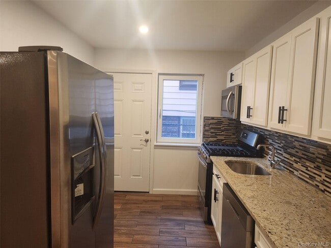 property at 79-56-79-77 77th Ave