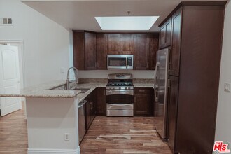 1225 Armacost Ave-Unit -106 in Los Angeles, CA - Building Photo - Building Photo