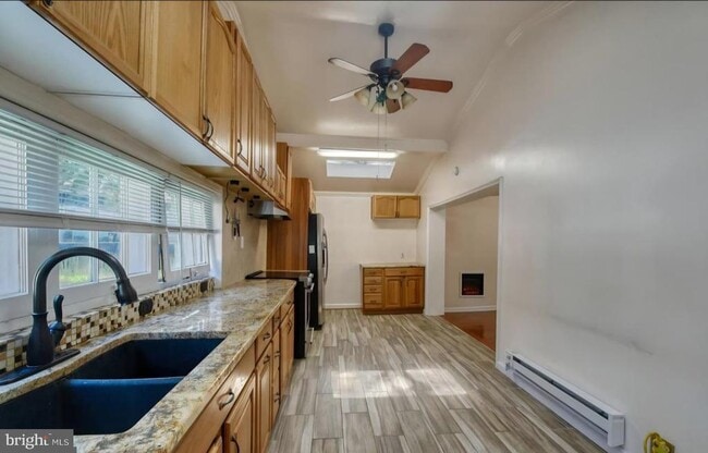 property at 8400 Alpaugh St