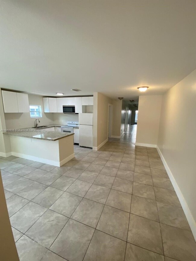 property at 5447 NW 5th Ct