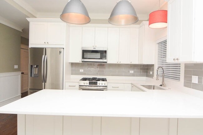 3451 N Hoyne Ave, Unit 1 in Chicago, IL - Foto de edificio - Building Photo