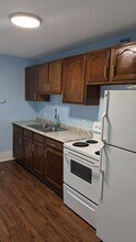322 W Maple St, Unit #1 in Lansing, MI - Foto de edificio - Building Photo