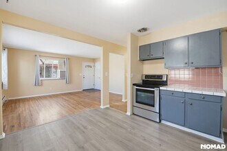 1182 W Ida Ave in Littleton, CO - Foto de edificio - Building Photo