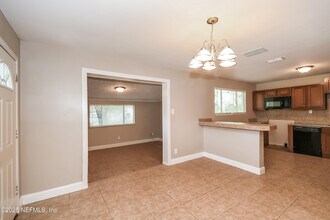 6965 Miss Muffet Ln N in Jacksonville, FL - Building Photo - Building Photo