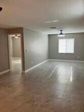 129 Boundary Blvd, Unit A in Rotonda West, FL - Foto de edificio - Building Photo