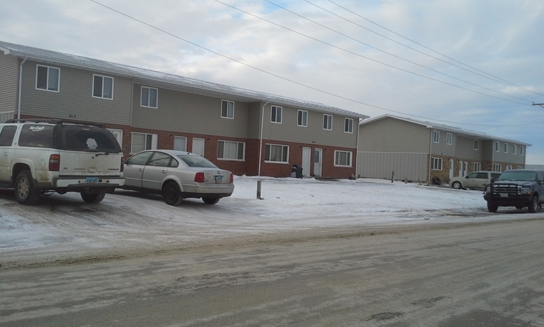 Highland Court Apartments in New Town, ND - Building Photo