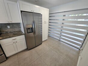 9944 Costa Del Sol Blvd in Doral, FL - Building Photo - Building Photo