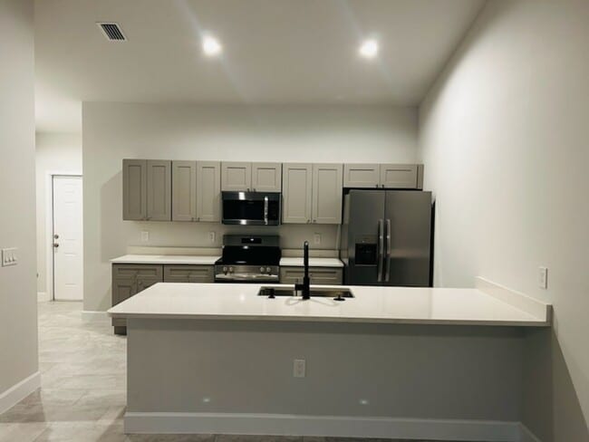 property at 4608-4610 SW 8th Ct