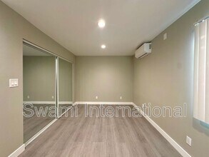 7102 S Figueroa St in Los Angeles, CA - Building Photo - Building Photo